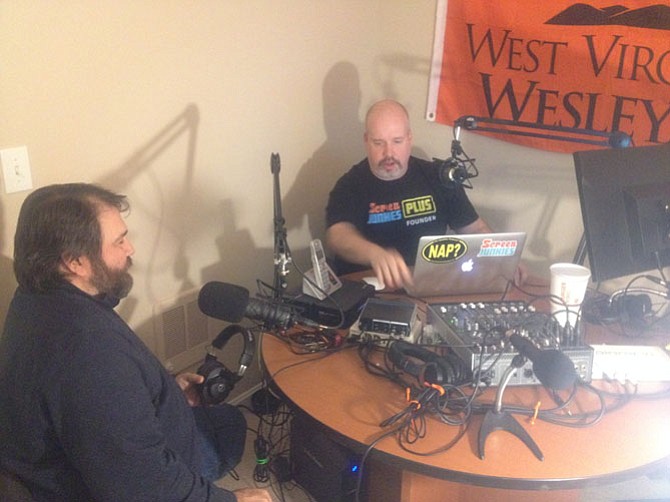 Herndon residents Brett Simons and Bill McKenna recording their weekly podcast at downtown Herndon. 
