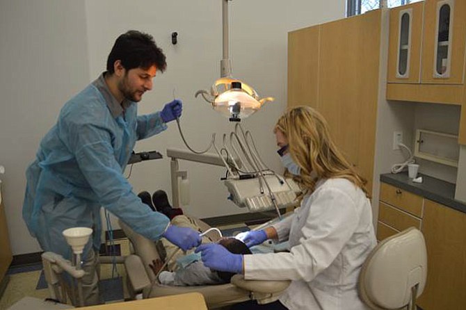 NOVA MEC students perform dental services during the Give Kids a Smile event on Friday, Feb. 5.
