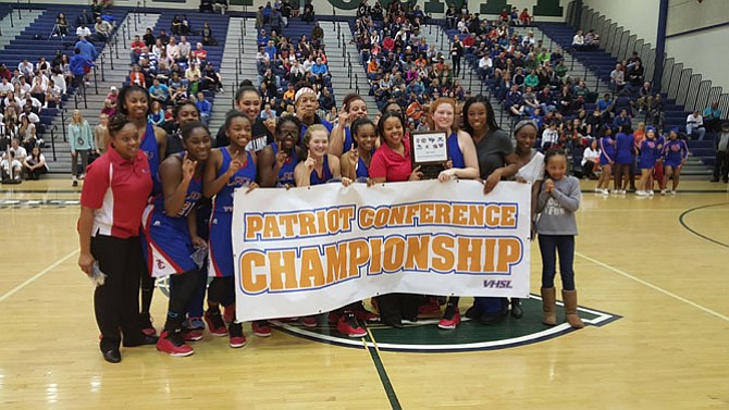 The T.C. Williams girls’ basketball team defeated West Springfield 69-66 in double overtime on Feb. 21 to win the Conference 7 championship.