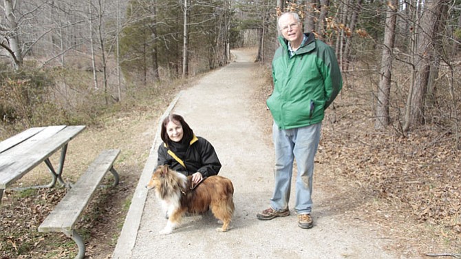 Robert Updegrove, retired library director, Fairfax, and his wife Maria enjoy their dog’s companionship.
