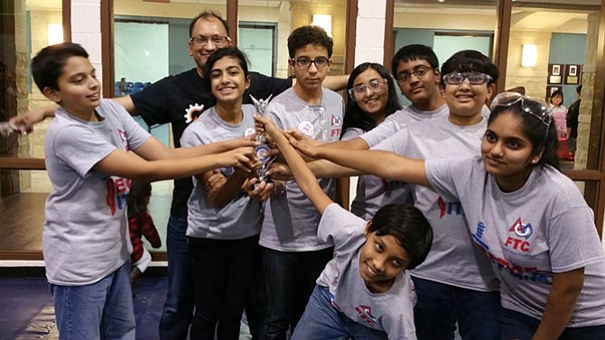 From left, Vishnu Murthy,  Fairfax, Thomas Jefferson High School; Hossain Rahman, Chantilly,  coach; Jasmine Malik, Chantilly, John Champe High School; Ameen Alouou,  Centreville, Rocky Run Middle School; Ridha Chowdhary,  Chantilly, Eagle Ridge Middle School; Natasha Rao,  Fairfax,  Thomas Jefferson High School; Vinay Jagan,    Stone Ridge, Mercer Middle School; Faraaz Rahman,   Chantilly, Michael Lunsford Middle School; Sonika Vuyyuru,  Chantilly, Stone Hill Middle School.
