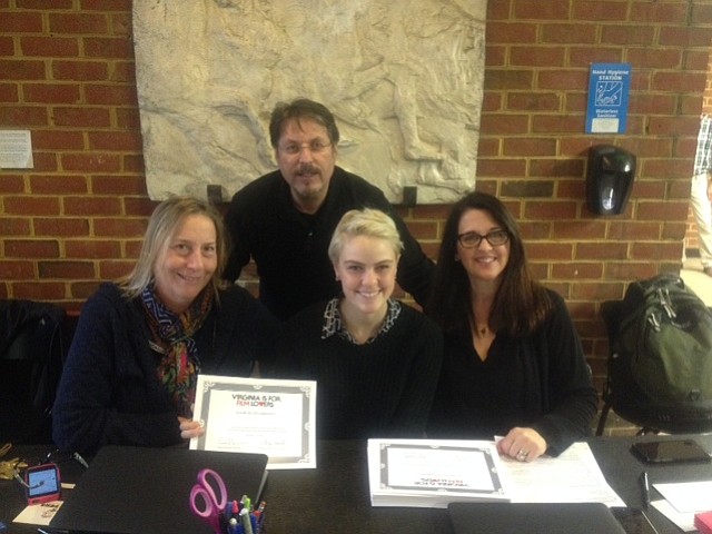 Peg Crowder with the Virginia Production Alliance, Anne Chapman and Emily Wyman with the Virginia Film Office, and film professional Gary Fiorelli smile for a photo at the GMU Harris Theatre in Fairfax. A two-day workshop was held at GMU to provide training for Production Assistant positions.