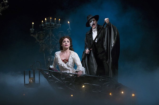 Mary Michael Patterson as Christine Daae and Hugh Panaro as The Phantom in “Phantom of the Opera.”
