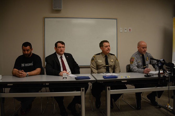 From left, Peer support specialist supervisor and senior recovery coach with Substance Abuse Addiction and Recovery (SAARA) Nick Yacoub, Supervisor Pat Herrity (R-Springfield), Loudoun County Sheriff Mike Chapman and Fairfax County Police Department Commander of the Organized Crime and Narcotics Unit Captain Jack Hardin discuss the use of heroin and other opioid drugs in Fairfax County.