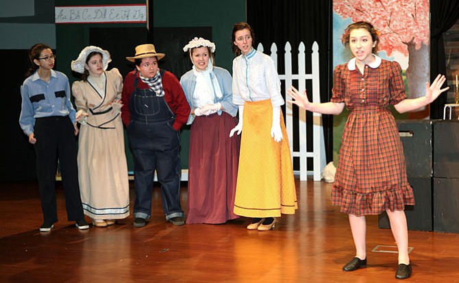 From left:  Isabela Wilson, Alexandra Dauchess, Kate Waggoner, Katie Hale, Mary Leaver, Katie McNeish in Oakcrest School's production of “Anne of Green Gables: The Musical.”
