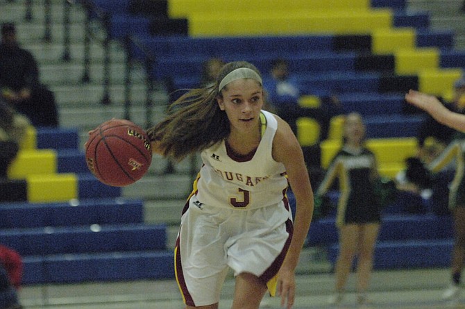 Oakton senior Alex Marquis scored 12 points during the Cougars’ state quarterfinal victory over Woodbridge on Saturday.