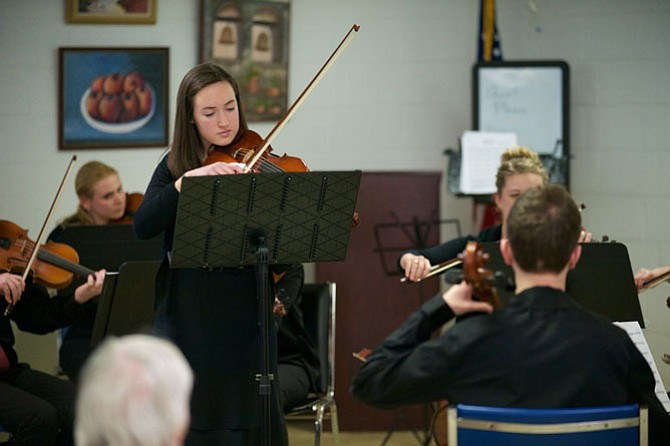 Crescendo Violinist Isabel Rogers leads the ensemble in a side-by-side performance of Astor Piazzola’s "Four Seasons."
