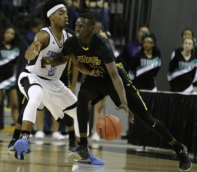 Wakefield senior Deng Nhial scored 11 points during the Warriors’ loss to L.C. Bird in the 5A state semifinals on March 8 at VCU.