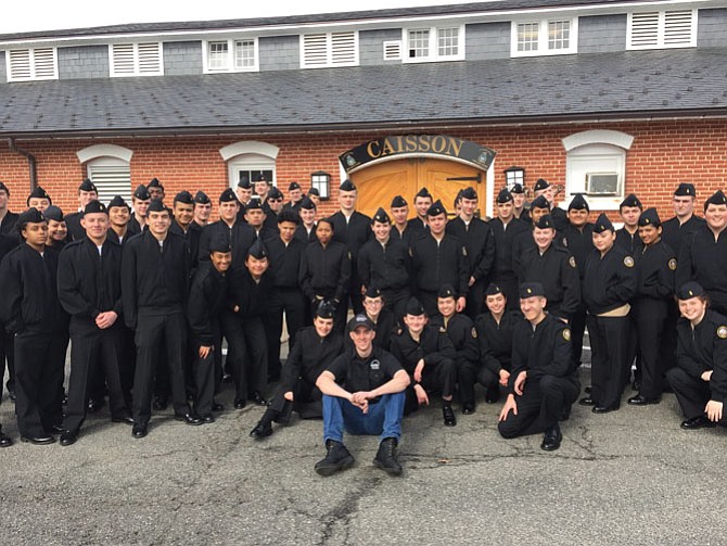 Cadets pose in front of The Old Guard Stables where caissons used to carry presidents and soldiers to their final resting place.
