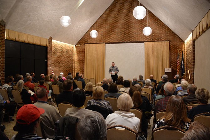 Fairfax County Captain Jeff Powell speaks to a meeting of the Mason Neck Citizens Association regarding the shooting death of resident Johan de Leede.