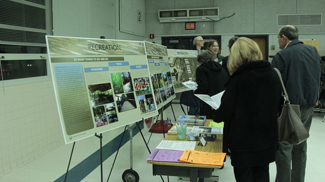 Project managers displayed boards presenting information about Lake Accotink, including facts about Recreation and Wildlife.
