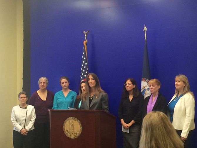 Del. Eileen Filler-Corn (D-41) with advocates addressing the press conference.
