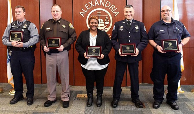 Five Crisis Intervention Team members were honored March 15: Officer Frank Powers, Deputy Darold Crawford, Public Safety Communications Officer Kanesha Foster, Officer Tarek Helmy, and Paramedic Chip Myers.
