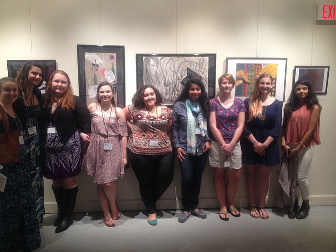 Herndon High School students pose for a picture during the March 16 evening reception at the 6th Annual Mind Heart Vision Exhibit. The exhibit closes on March 27. 
