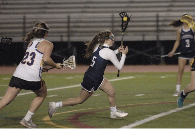 Woodson sophomore Logan Dougherty scored six goals against Lake Braddock on Tuesday.