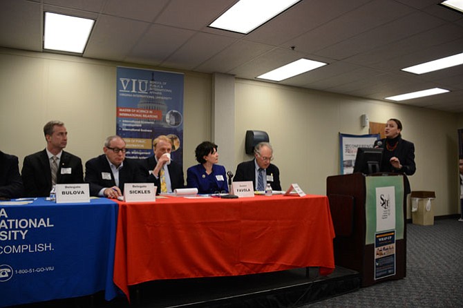 Dr. Klara Bilgin, dean of the Virginia International University School of Public and International Affairs (right) welcomes legislators from the General Assembly to the Social Issues Forum and Richmond Wrap-up hosted by the Social Action Linking Together (SALT) on Sunday, April 3.
