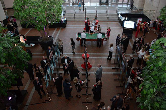 At the Las Vegas-themed Friends of UCM 2016 Spring Gala held at the U.S. Patent and Trademark Office in Alexandra, a silent auction preceded dinner and client remarks.  