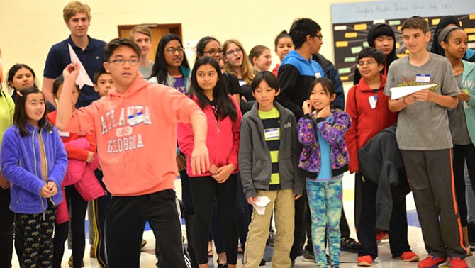 Jonathan Kan, an eighth-grader from Rocky Run Middle School in Chantilly, represents Team Big Pumpkin in the Paper Airplane Build and Fly Competition – and they won.
