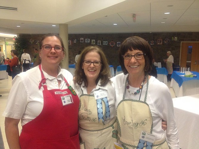 Barbara Philipps, Mary Beth DiVincenzo and Evelyn Mercantini smile for a photo at Floris United Methodist Church on Frying Pan Road in Herndon. The ninth annual Empty Bowls event was well attended and all proceeds went directly to nonprofit Food for Others.
