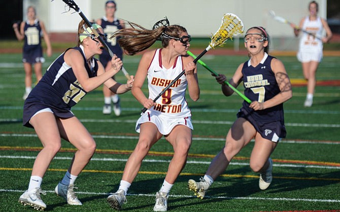 Kelly Larkin and the Bishop Ireton girls’ lacrosse team recently suffered their first losses of the season, falling to Good Counsel (pictured) on April 8 and McDonogh on April 11.