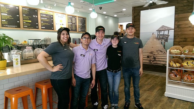 (From left) Shauntel Carter, Larry Calma, owner Trung Tang, Lauren Beck and Abel Ruiz run the recently opened Tropical Fruit Smoothie Café in Dunn Loring. 