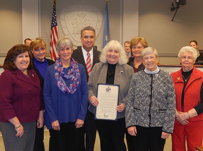 The Fairfax City Council honors the 60th anniversary of the Woman’s Club of Fairfax. Back row, from left are Jo Ormesher, Scott Silverthorne and Joyce Wegner; (front row, from left) Ellie Schmidt, Jane Albro, Diane Tuininga, Betty Powell and Dolores Testerman.
