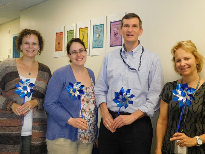 From left: Tracy Leonard, public education manager, SCAN of Northern Virginia; Susan Britton, Child Advocacy Center program director, The Center for Alexandria’s Children; Doug Brown, Child Protective Services program manager, Alexandria Department of Community and Human Services; and Elizabeth Willingham, program supervisor, Healthy Families Arlington/Alexandria - Northern Virginia Family Service.
