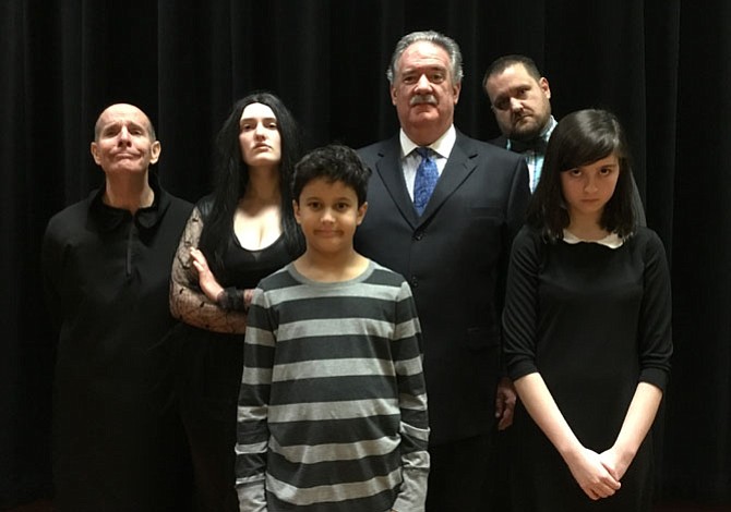 Meet the Addams family: From left are Mike Cash, Grace McCarthy, Noah Tajudeen, Jim Mitchell, Joey Kelesides Olson, and Lucia LaNave.

