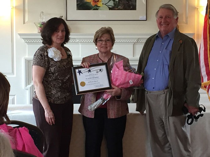From left, Director, District II, National Capital Area Garden Club Arlene Stewart presents the 2016 Award of Honor to Dominion Valley Garden Club member Millicent Rever, joined by her husband Jack Rever.