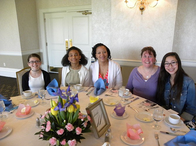 From left, Guests of DKG member Lamepa Bronell (middle) -- Emily Brown, 11, of Springfield; Olena Bronell, 12, of Annandale, Laura Reed, of Gainesville; and Alexis Wong, 14, of Gainesville -- attend the Beta Delta Chapter of DKG luncheon at the Springfield Golf and Country Club on Sunday, April 17.
