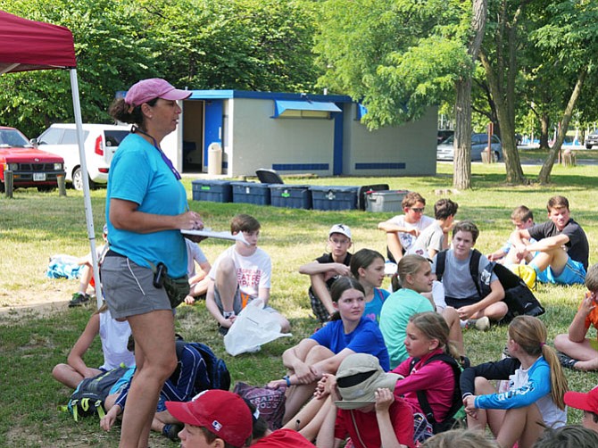 Amy Zang, director and owner of the Youth Sailing Day Camp at the Washington Sailing Marina lays out the day’s activities for the campers.  The camp runs from 9:30 a.m.-4 p.m. five days beginning May 31, the Tuesday after Memorial Day. 
