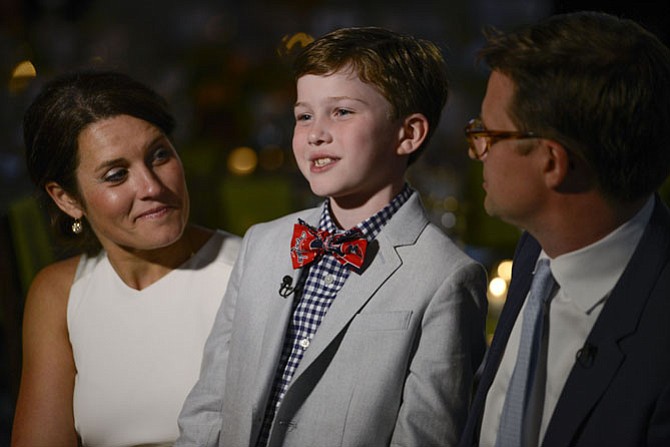 Bensten Schone of McLean and his mother and father, Heather and Lance.
