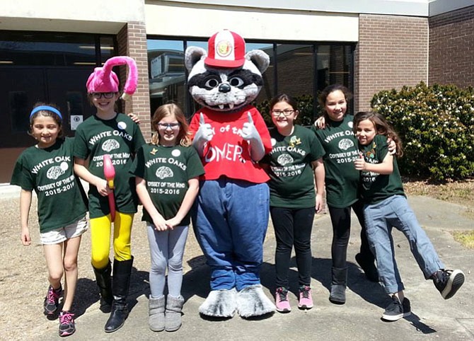 From left, Virginia Fife, Katelyn Sullivan, Emma Hrabak, OMER (Odyssey of the Mind mascot), Minah Sisco, Kasey Petrie and Reira Erickson.
