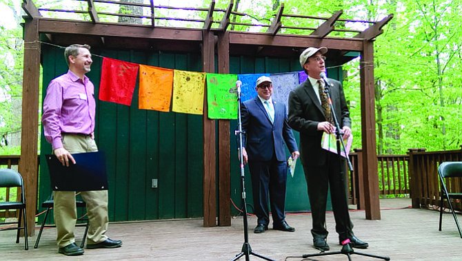 From left, Burgundy Head of School Jeff Sindler, Del. Mark Sickles (D-43) and Del. Paul Krizek (D-44) speak to students at Burgundy Farm Country Day School on the occasion of the school’s 70th birthday and Earth Day.