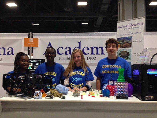 Cortona Academy students Araba Dadzie, Nana Dadzie, and Aedan Anders recently displayed projects from their STEM class at the 2016 USA Science and Engineering Festival in Washington, D.C. The projects include an underwater robot to help save the coral reef and items printed with one of Cortona's 3-D printers.
