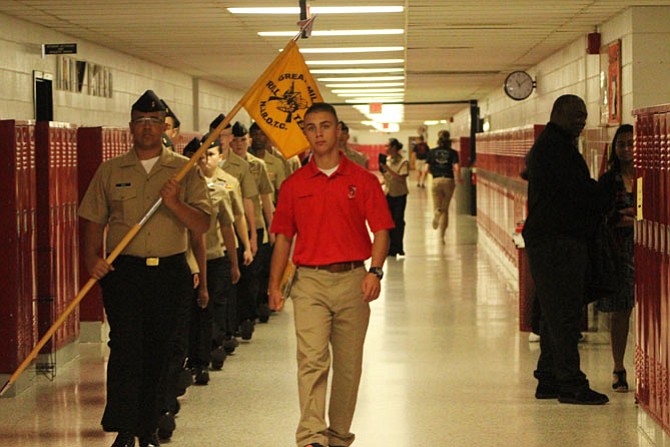 Herndon HS Cadet escorts a guest school to their event
