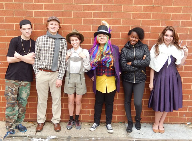 The golden-ticket holders are (from left) A.J. Kapfer (as Mike Teavee), Caleb Mitchell (Charlie Bucket), Jared Belsky (Augustus Gloop), Emily Fareid (Willy Wonka), Melanie Wendo (Violet Beauregard) and Caroline Woodson (Veruca Salt).
