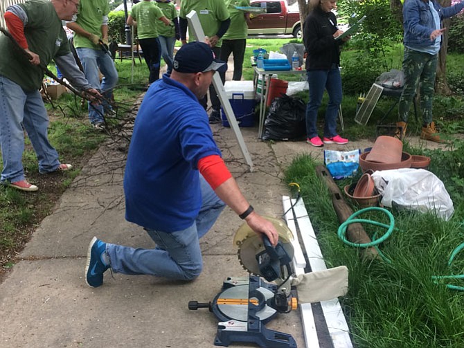 Rebuilding Together Alexandria volunteers provide free home repairs for low-income homeowners.
