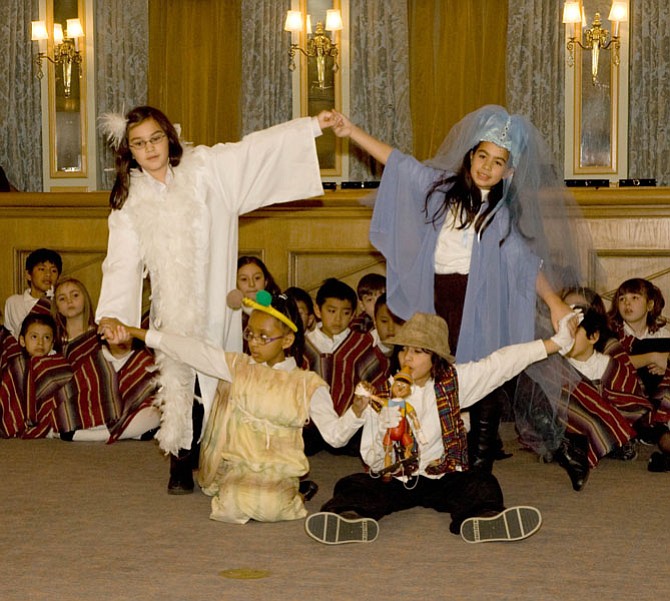 The Spanish Chorus does more than just sing. The children dance and act out stories for Arlington audiences.
