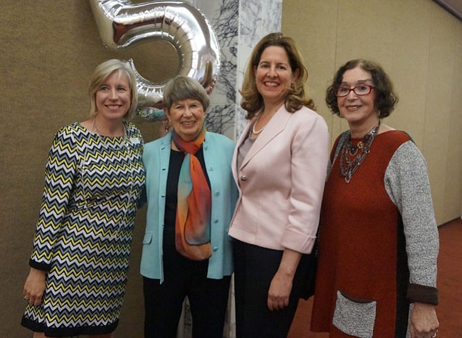 AHA executive director Cele Garrett, board member Barbara Rosenfeld, Mayor Allison Silberberg and author Judith Viorst celebrate the 5th anniversary of At Home in Alexandria May 17 at Beth El Hebrew Congregation.
