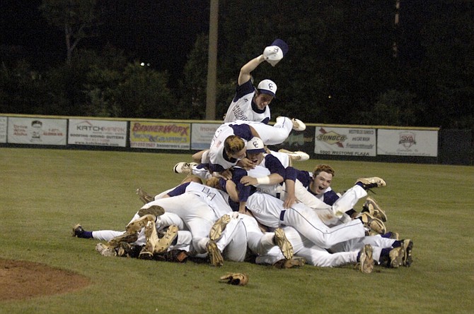 Members of the Chantilly baseball team leap onto a celebratory pile after winning the Conference 5 championship with a 4-2 victory over Centreville on Friday at Westfield High School.