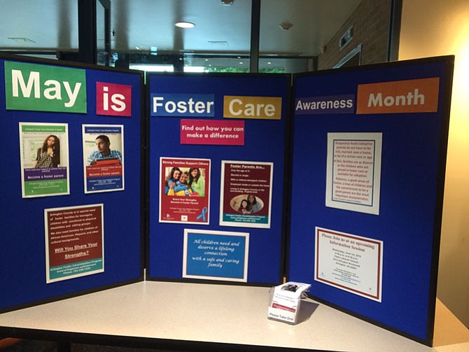 Poster at the Arlington County library: May is Foster Care Month. 
