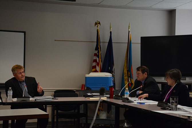 Supervisors (from left) John Cook (R-Braddock), Pat Herrity (R-Springfield) and Kathy Smith (D-Sully) discuss further police use of force and communications questions at the May 24 meeting of the Fairfax County Public Safety Committee meeting.