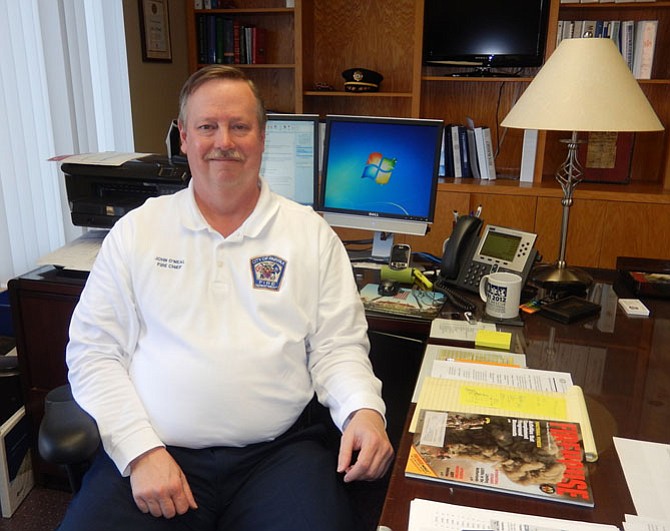 City of Fairfax Fire Chief John O’Neal in his office.
