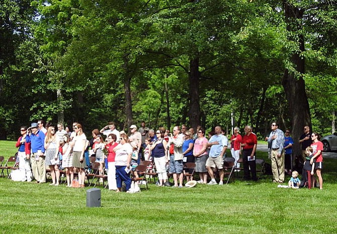 Friends, families and supporters of military men and women who gave the ultimate sacrifice for their country sat on folder chairs set up on the Conservancy’s expansive green lawn.