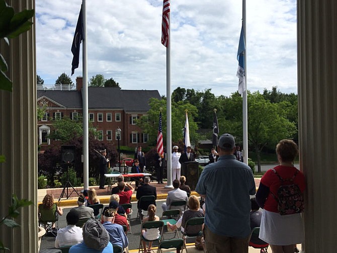 Speakers at the May 30 Memorial Day ceremony in Fairfax took turns reading names of fallen soldiers who were from Fairfax and Fairfax County, going back to World War I.