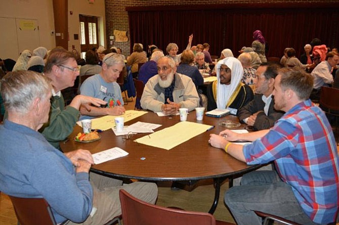 A joint meeting of the Mount Vernon Unitarian Church and the Islamic Center of North America - Virginia heard a presentation by Corey Saylor, director of the Department to Monitor and Combat Islamophobia at the Council on American-Islamic Relations, then held group discussions and posted proposals for further work together. 
