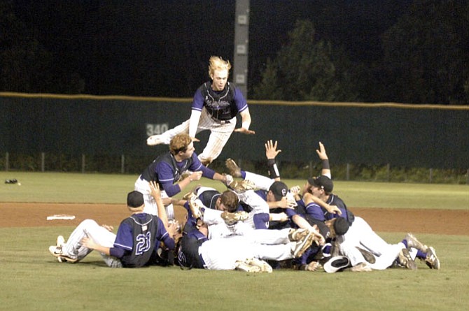 Members of the Chantilly baseball team celebrate winning the 6A North region championship on Friday.