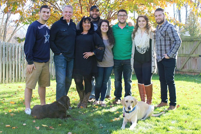 The Shock family has dealt with kidney failure and transplant before. From left, Logan, Ed, Mary Ann, Emery, Meredith, Austin, Madison and Hayden.