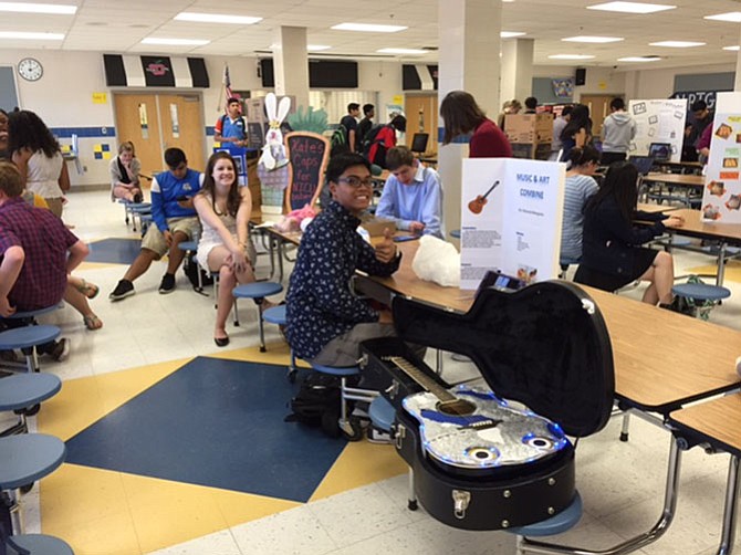 Dhanzel Mangona, worked on designing and decorating his own guitar for his IB MYP Personal Project Showcase.
